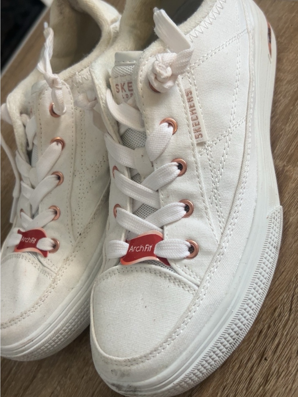 Skechers Women's White Canvas Sneakers with Rose Gold Eyelets